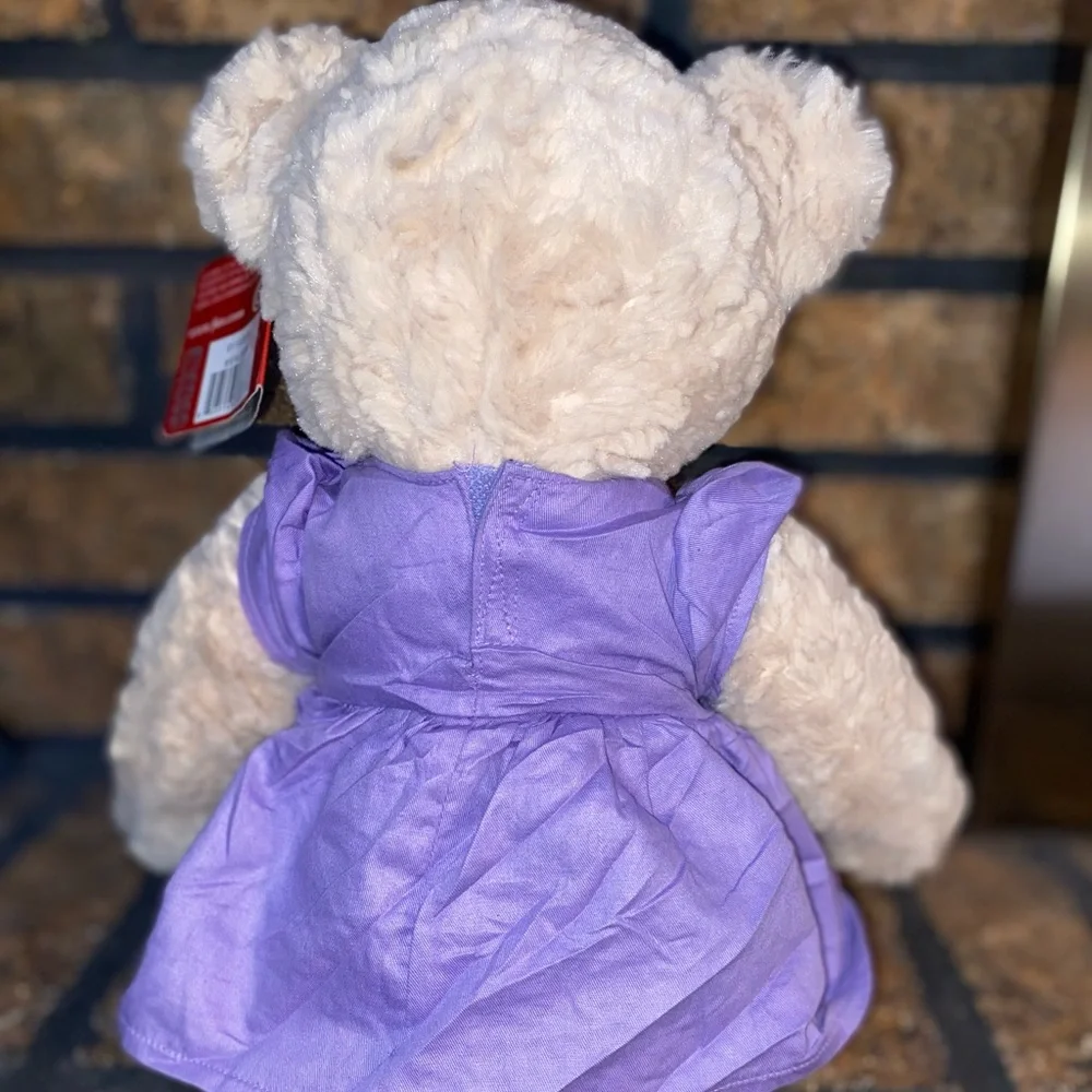 FAO Schwarz bear stuffed animal. 2016 Geoffrey, Purple dress and bow. - Picture 5 of 7